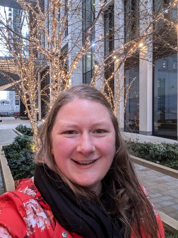 a woman smiling for a picture