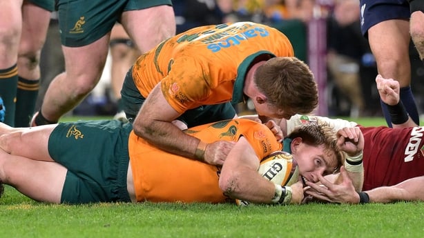 BRISBANE, AUSTRALIA - JULY 19: Tate McDermott of the Wallabies scores a try during game one of the series between Australia Wallabies and British & Irish Lions at Suncorp Stadium on July 19, 2025 in Brisbane, Australia. (Photo by Bradley Kanaris/Getty Images)
