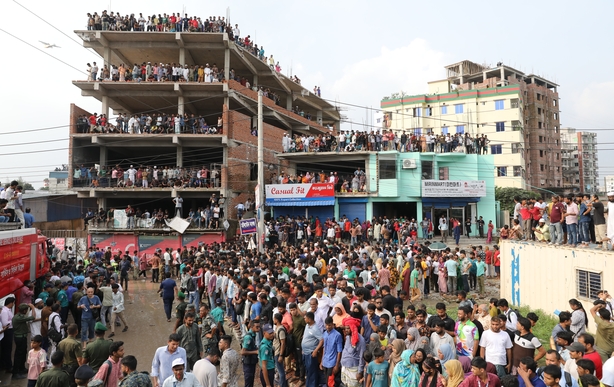 Parents and families of Milestone School and College students gather at the college campus looking for their children