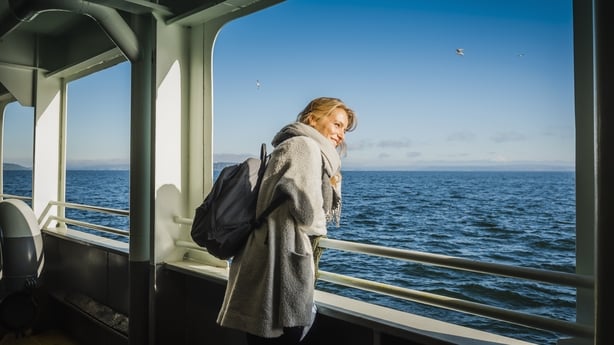 woman enjoying a boat trip