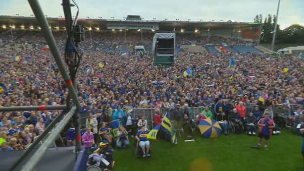 a large crowd of people at Semple Stadium