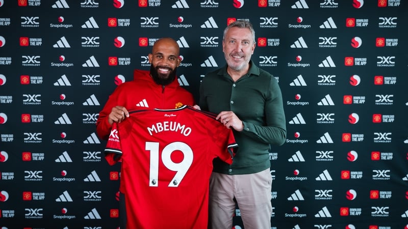 Bryan Mbeumo poses with Manchester United Director of Football Jason Wilcox