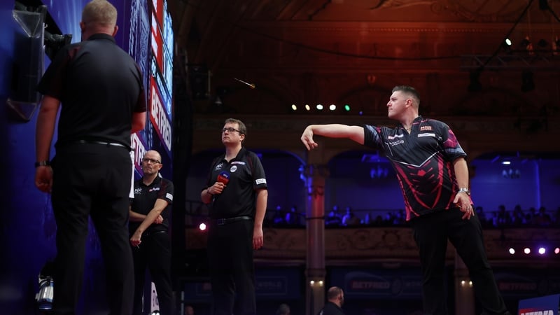 Daryl Gurney throws during his defeat to Gerwyn Price