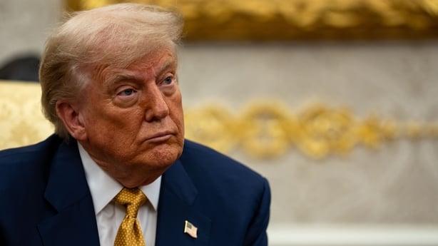 US President Donald Trump sits in the Oval Office during a meeting with the Prime Minister of Bahrain
