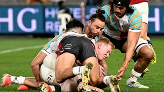 British and Irish Lions' Jamie Osborne (C) scores a try during the rugby tour match against the First Nations & Pasifika XV at Docklands Stadium in Melbourne on July 22, 2025.