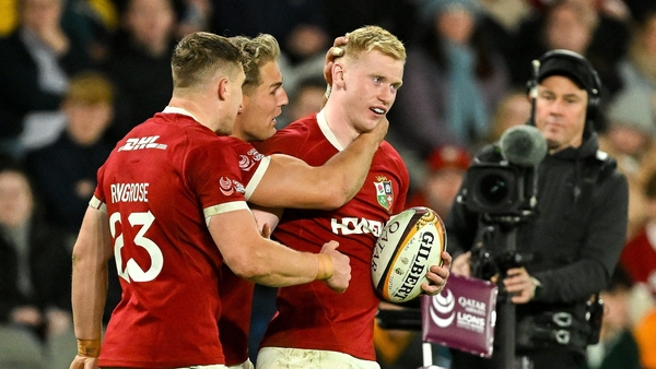 22 July 2025; Jamie Osborne of British & Irish Lions, right, celebrates with teammates Garry Ringrose and Duhan van der Merwe after scoring their side's third try during the tour match between First Nations & Pasifika XV and the British & Irish Lions at M