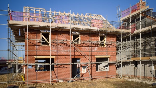 New build housing development with clear blue sky