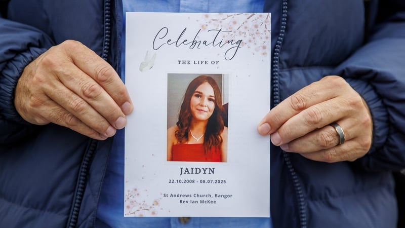 a person holding a card