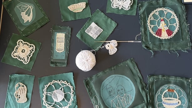 table filled with needlework lace by Fiona Harrington