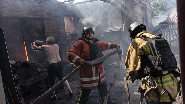 a group of firefighters working on a fire