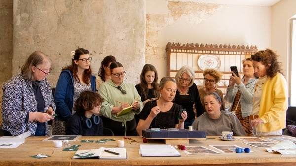 a group of people around a table