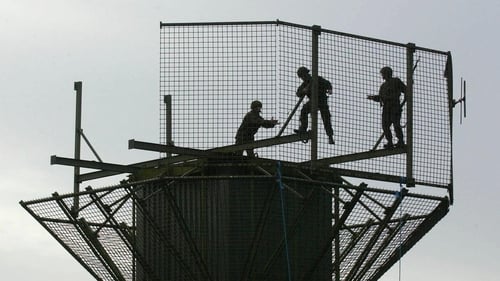 British Army engineers dismantle a watchtower at Newtonhamilton in October 2001. Photo: John Giles/Pool/AFP via Getty Images
