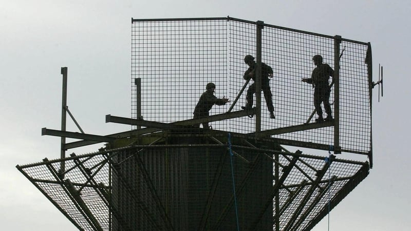 British Army engineers dismantle a watchtower at Newtonhamilton in October 2001. Photo: John Giles/Pool/AFP via Getty Images