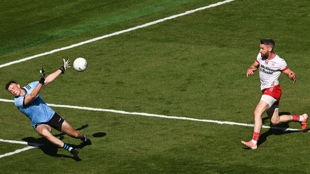 12 July 2025; Mattie Donnelly of Tyrone shoots at goal under pressure from Kerry goalkeeper Shane Ryan during the GAA Football All-Ireland Senior Championship semi-final match between Kerry and Tyrone at Croke Park in Dublin. Photo by Ramsey Cardy/Sportsfile