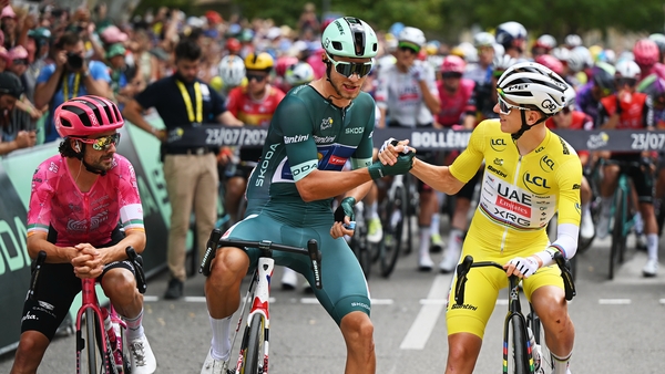 (L-R) Ben Healy of Ireland and Team EF Education - EasyPost most combative rider prize winner, Jonathan Milan of Italy and Team Lidl - Trek - Green Sprint Jersey and Tadej Pogacar of Slovenia and UAE Team Emirates - XRG - Yellow leader jersey prior to the