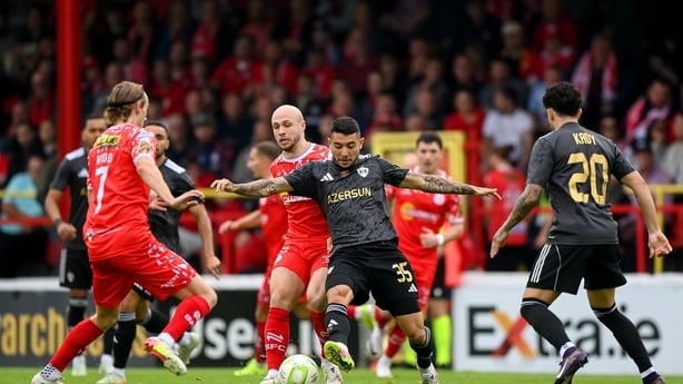 Pedro Bicalho of Qarabag in action against Kerr McInroy of Shelbourne - Champions League, July 2025