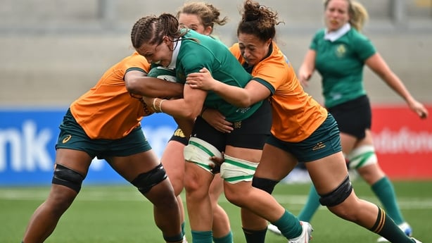 14 September 2024; Brittany Hogan of Ireland is tackled by Siokapesi Palu and Leilani Nathan of Australia during the Women's Rugby International match between Ireland and Australia at the Kingspan Stadium in Belfast. Photo by Oliver McVeigh/Sportsfile