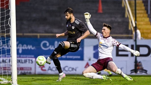 Nariman Akhundzade of Qarabag scores his side's third goal despite the efforts of Shelbourne goalkeeper Lorcan Healy during the UEFA Champions League Second Qualifying Round first leg match between Shelbourne and Qarabag FK at Tolka Park in Dublin. Photo by Ben McShane/Sportsfile