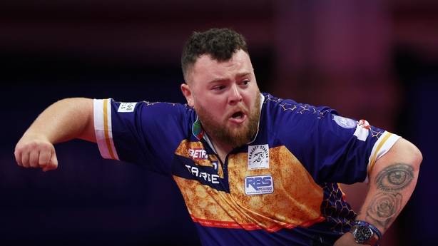 Josh Rock of Northern Ireland celebrates after victory in the Second Round match between Michael van Gerwen of the Netherlands and Josh Rock of Northern Ireland on day five of the 2025 Betfred World Matchplay at Winter Gardens on July 23, 2025 in Blackpool, England.