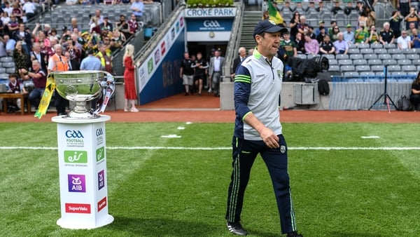 Kerry manager Jack O'Connor walks past the Sam Maguire Cup