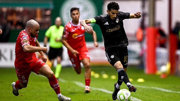 Abdellah Zoubir of Qarabag in action against Mark Coyle of Shelbourne during the UEFA Champions League Second Qualifying Round first leg match between Shelbourne and Qarabag FK at Tolka Park