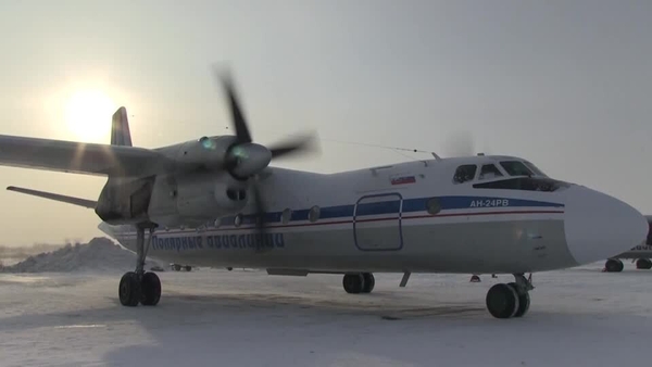 Image shows an Antonov An-24 Aircraft on the tarmac