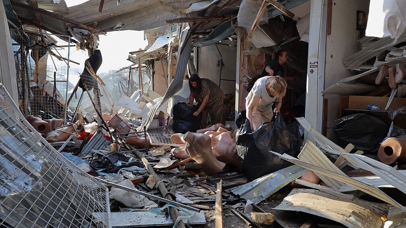 The aftermath of a Russian drone attack that damaged a building at the Privoz market