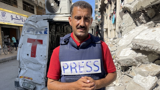 AFP journalist Khader Zaanoun poses for a picture in Gaza City 