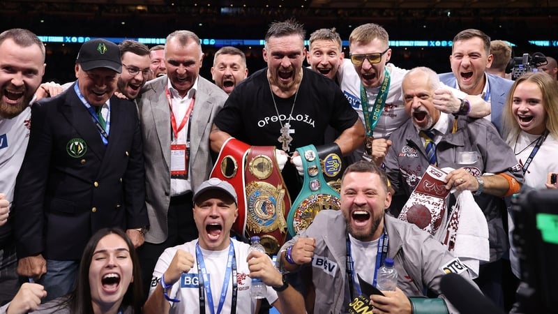 Oleksandr Usyk celebrating his win over Daniel Dubois
