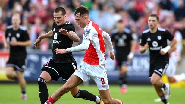 Mason Melia of St Patrick's Athletic in action against Danyl Mashchenko of Kalju - UEFA Conference League - July 2025