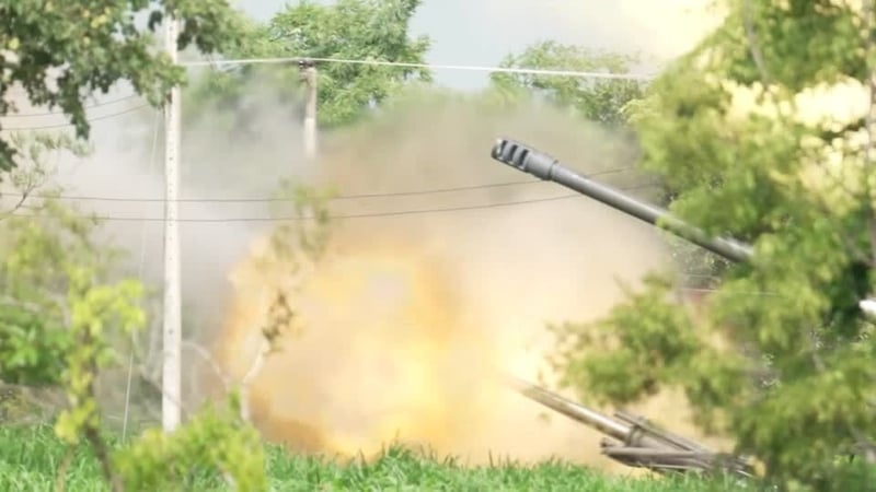 Thai military artillery is seen firing at the Cambodia border
