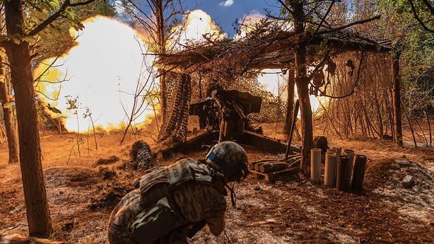 Ukrainian territorial defence soldiers fire D-20 artillery