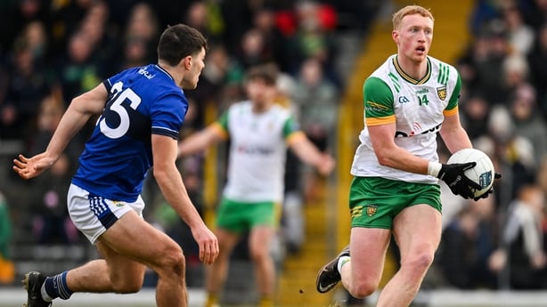 8 February 2025; Oisín Gallen of Donegal in action against Mike Breen of Kerry during the Allianz Football League Division 1 match between Kerry and Donegal at Fitzgerald Stadium in Killarney, Kerry. Photo by Brendan Moran/Sportsfile