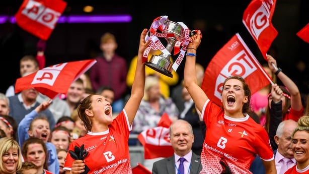 Sisters Aoife Byrne, left, and Eimear Byrne of Louth lift the West County Hotel Cup following the TG4 All-Ireland Ladies Football Junior Championship final win against Fermanagh in 2019