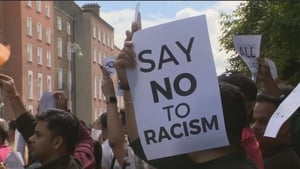 How does the goverment plan to respond to a spate of attacks on minorities in Ireland? show image