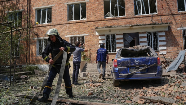 Rescuers work near a damaged tuberculosis dispensary after a Russian air attack n Kharkiv, Ukraine
