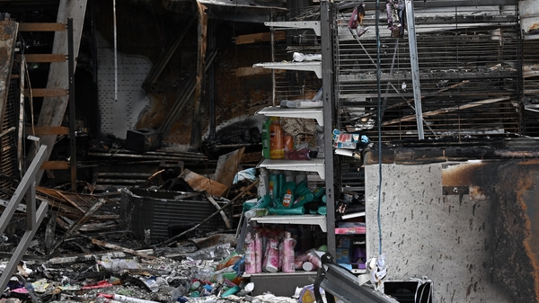 Damage from a fire caused by Cambodian artillery at a convenience store in the Thai border province of Sisaket province