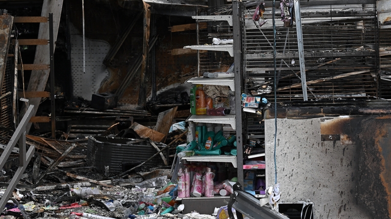 Damage from a fire caused by Cambodian artillery at a shop in the Thai border province of Sisaket