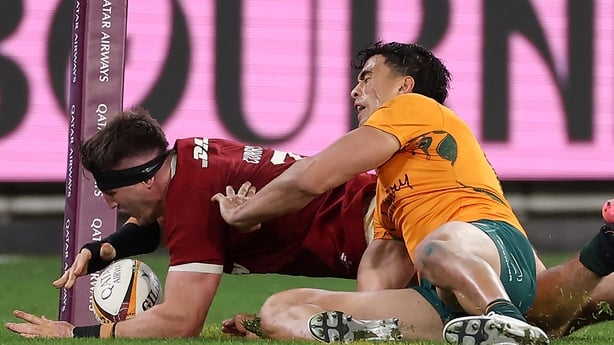 British and Irish Lions' Tom Curry scores a try