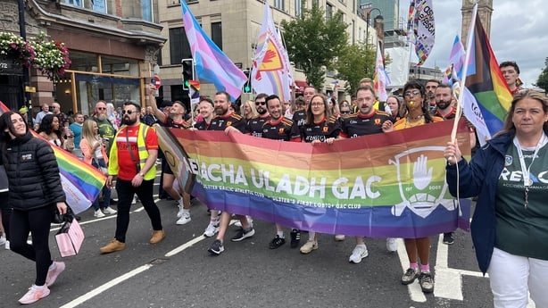 a group of people walking in a parade