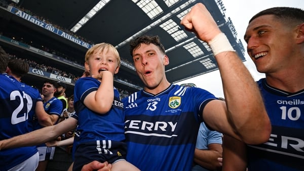 27 July 2025; David Clifford of Kerry celebrates with his son Ogie after the GAA Football All-Ireland Senior Championship final match between Kerry and Donegal at Croke Park in Dublin. Photo by Stephen McCarthy/Sportsfile