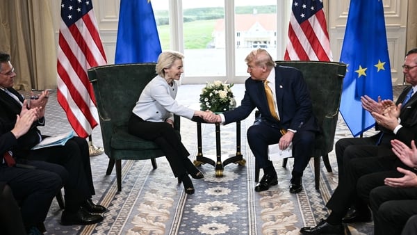 US President Donald Trump (R) shakes hands with European Commission President Ursula von der Leyen (L) following their meeting, in Turnberry south west Scotland
