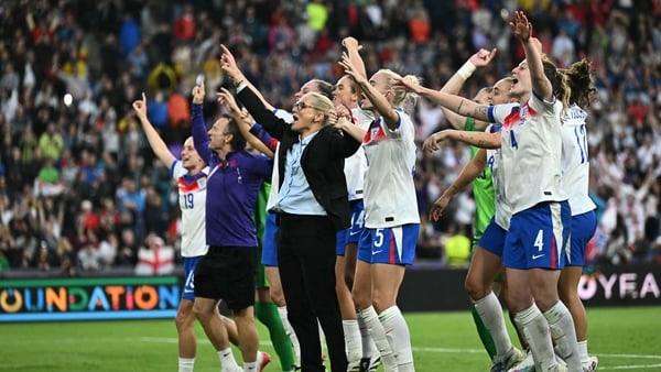 England's players and coaching staff celebrate winning the UEFA Women's Euro 2025 final f