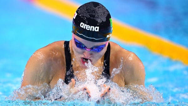 Ireland's swimmer Mona McSharry competes in a heat of the women's 100m breaststroke swimming event during the 2025 World Aquatics Championships