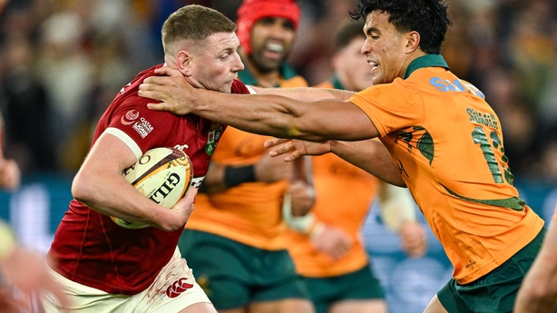 26 July 2025; Finn Russell of British & Irish Lions is tackled by Joseph-Aukuso Suaalii of Australia during the second test match between Australia and the British & Irish Lions at the Melbourne Cricket Ground in Melbourne, Australia. Photo by Brendan Moran/Sportsfile