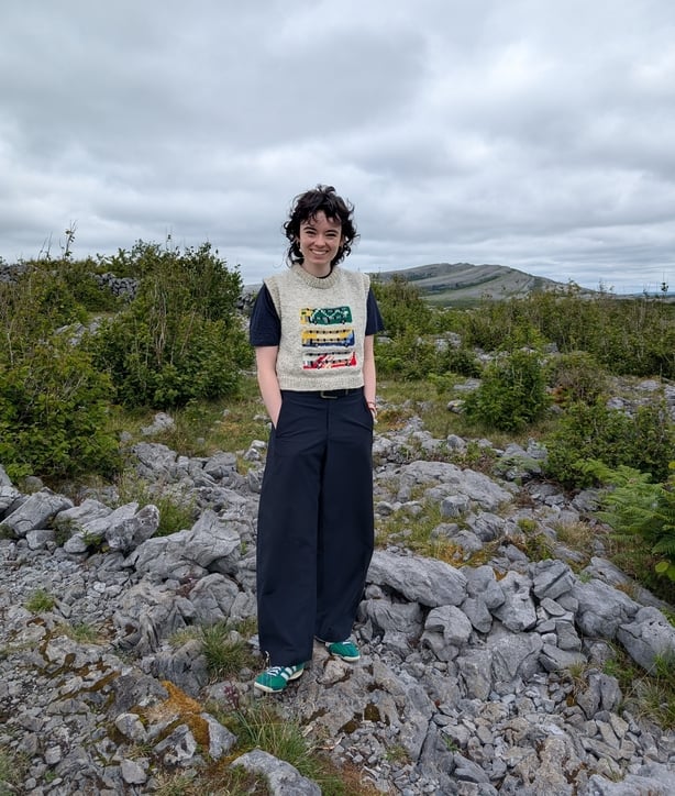 a person standing on rocks