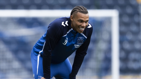 Corrie Ndaba with his hands on his knees during a training session with Kilmarnock