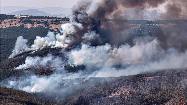 BURSA, TURKIYE - JULY 28: Smoke billows from a forested area in Orhaneli district of Bursa, Turkiye, on the third day of a wildfire that continues to rage despite ongoing firefighting efforts on July 28, 2025. Strong winds have hindered containment. (Photo by Mustafa Bikec/Anadolu via Getty Images)