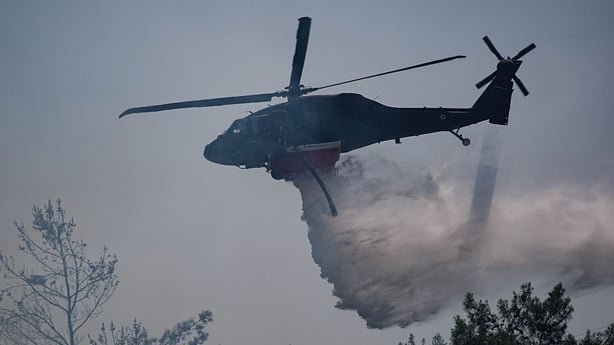 IZMIR, TURKIYE - JULY 28: Forest fire that broke out in forested area as efforts continue to bring the blaze under control by both aerial and ground firefighting teams in Gokdere neighborhood of Bornova district, Izmir, Turkiye on July 28, 2025. (Photo by Berkan Cetin/Anadolu via Getty Images)