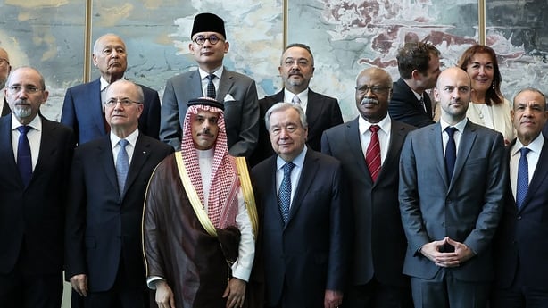 Palestinian Prime Minister Mohammad Mustafa (2L), conference co-chair Saudia Arabia's Foreign Minister Faisal bin Farhan Al-Saud (3L), UN Secretary General Antonio Guterres (C), and conference co-chair French Foreign Minister Jean-Noel Barrot (2R) stand for a group photo with high level ministers du